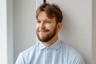 A portrait photo of Tom Heijmering